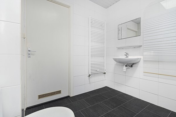 Medium property photo - Capadosestraat 228, 2523 AK Den Haag